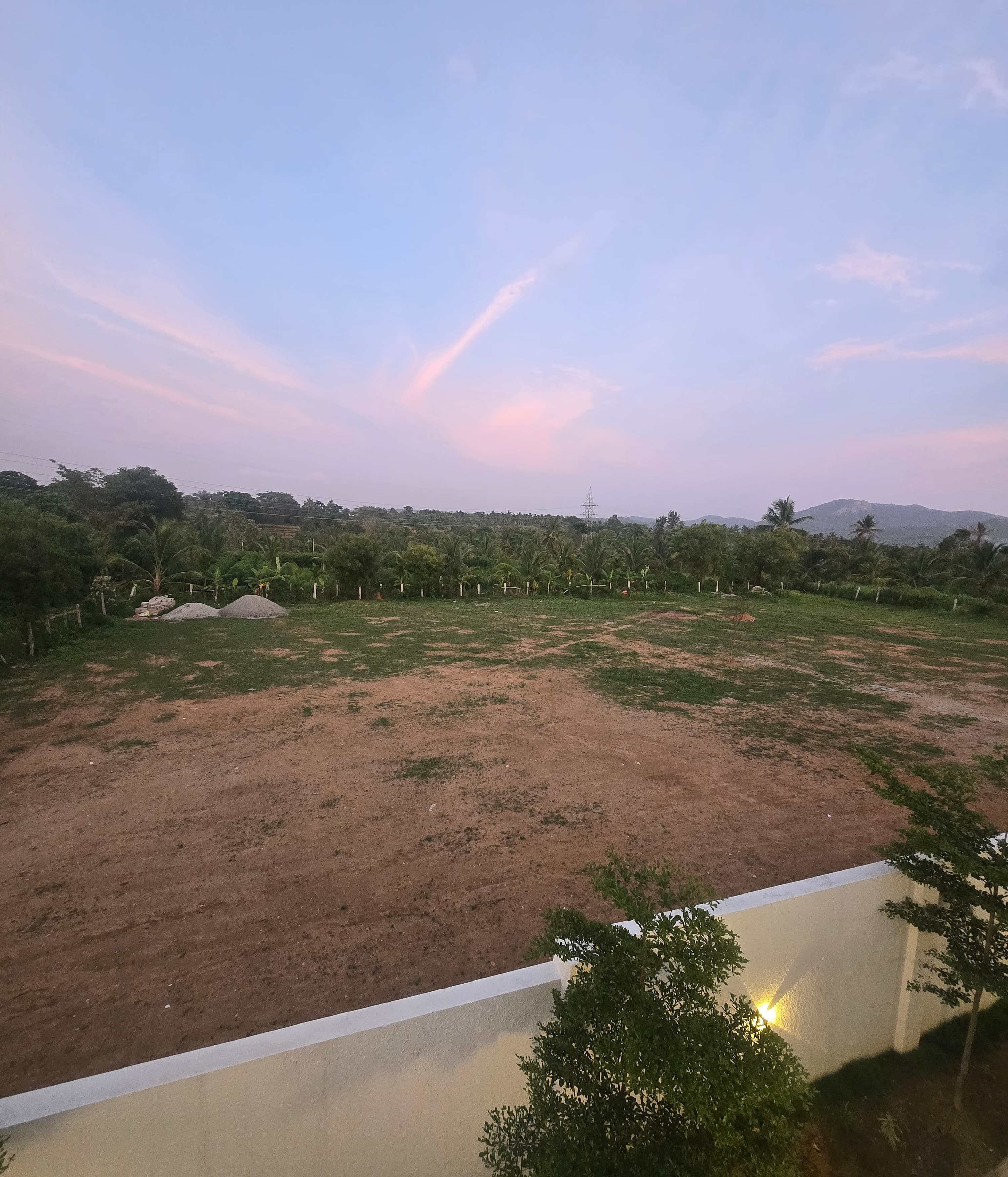 Open play area — flat open ground for cricket and sports