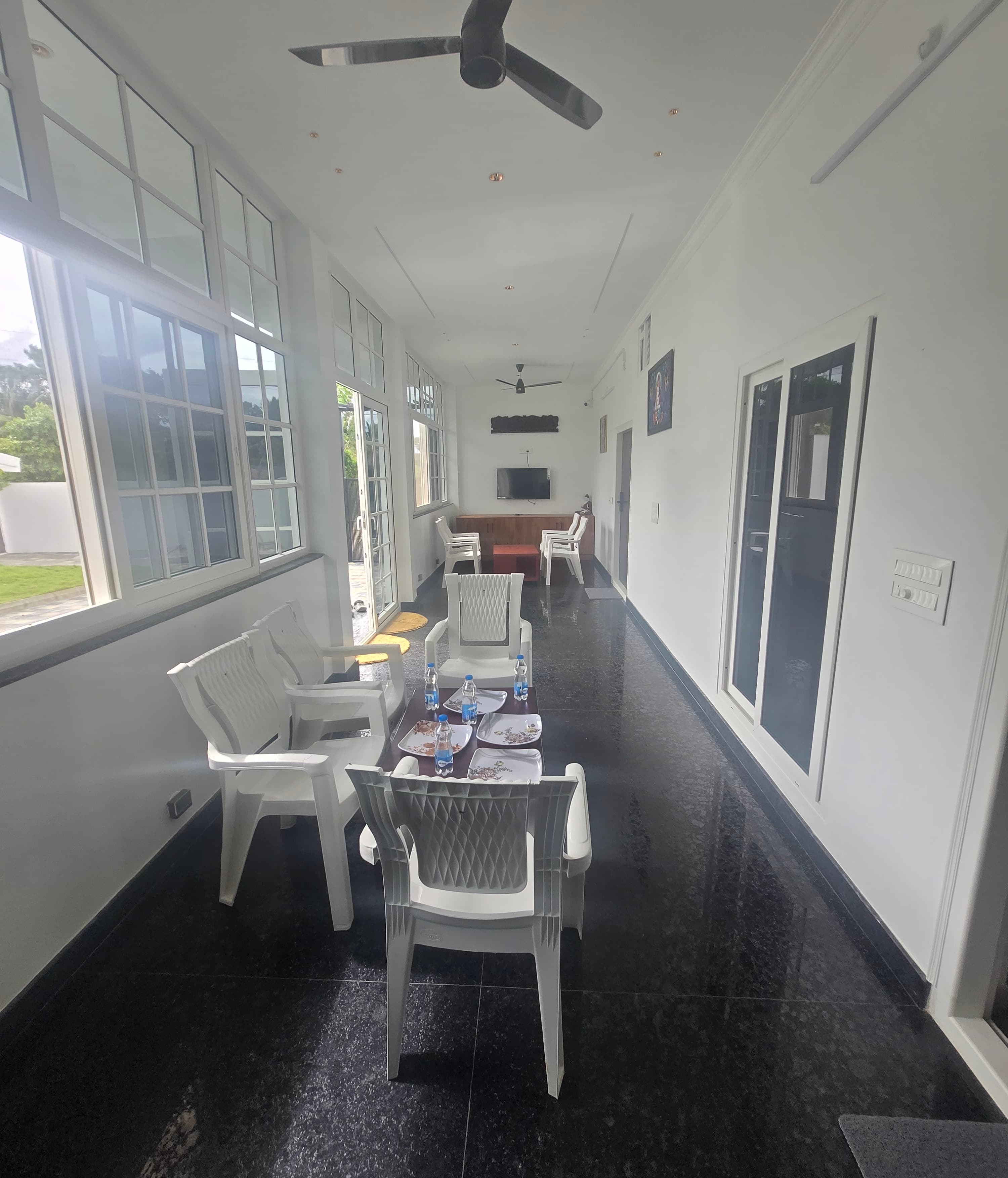 Open hall with grid windows and LED lighting