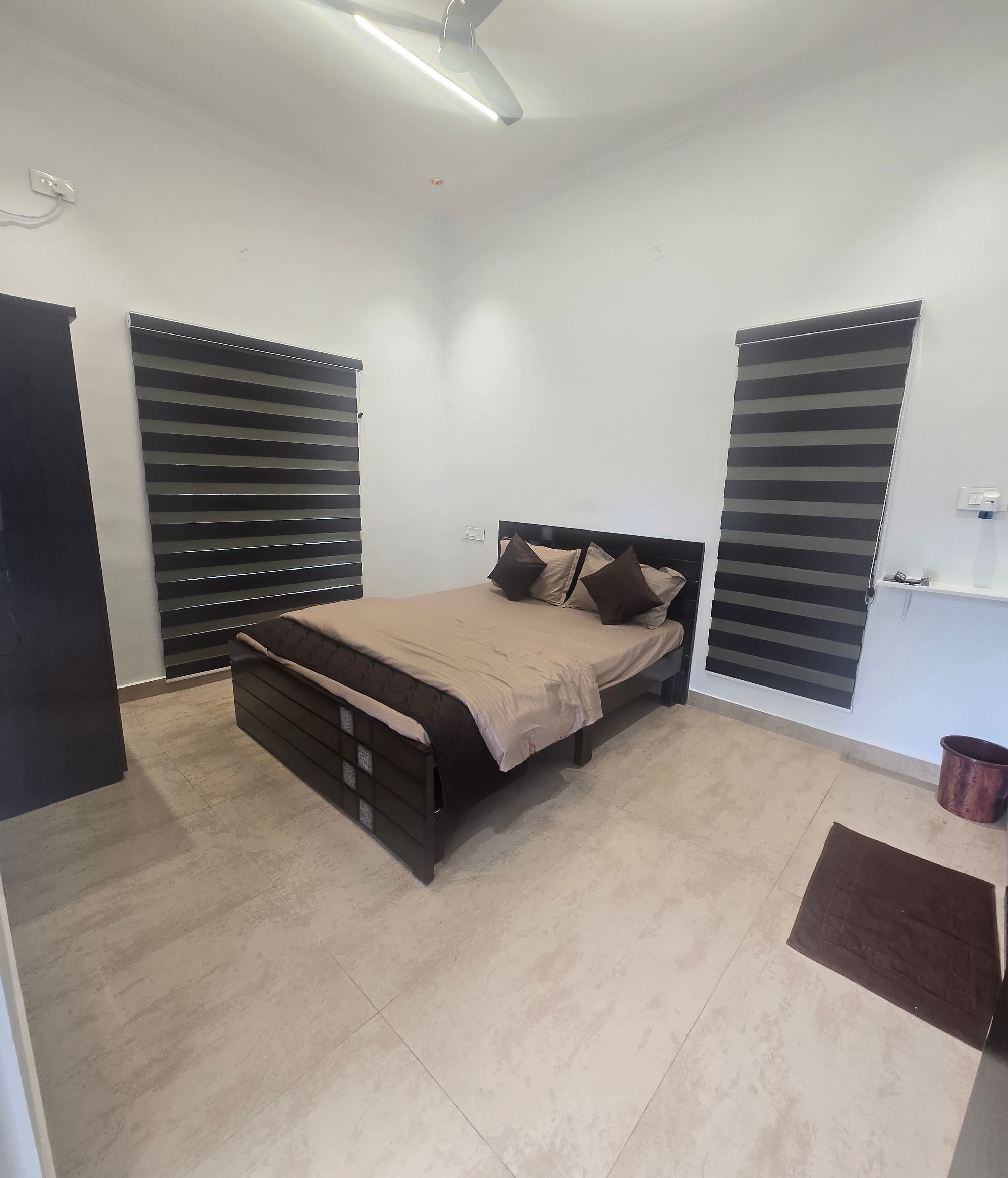 Bright ensuite bedroom with modern furnishings
